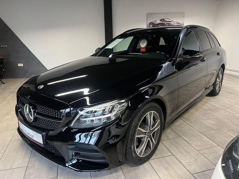 Schwarz Gebraucht 2019 Mercedes C220 AMG line Limousine | 18.700 € (Superpreis) - Bild 1/4