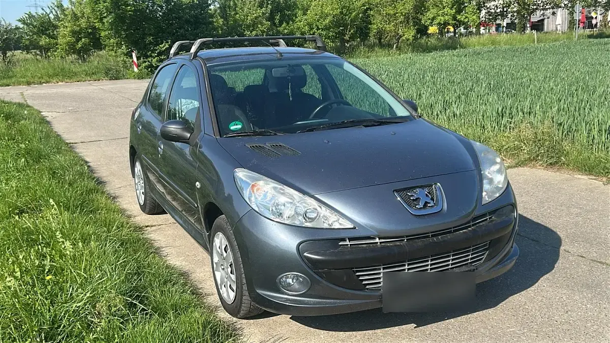 Gebraucht Peugeot 206+ 75 PS (55 kW) 2010 Grau Kleinwagen
