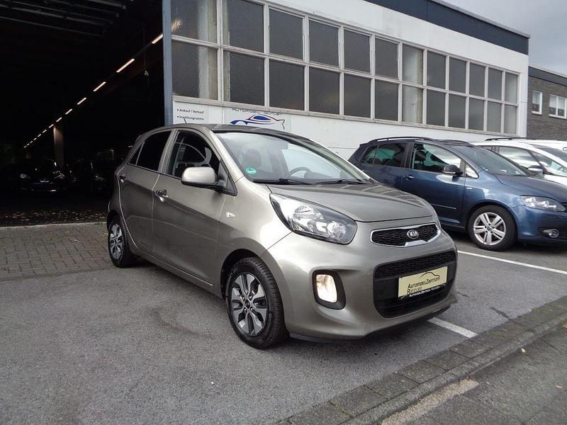 Silber Gebraucht 2015 Kia Picanto DREAM-TEAM Edition Kleinwagen | 6.990 € (Fairer Preis) - Bild 1/4