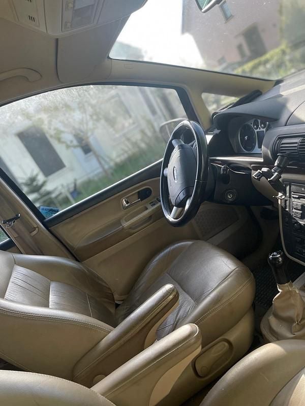 Second-hand Ford Galaxy 131 CP (96 kW) 2004 Roșu Monovolum