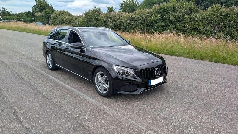Schwarz Gebraucht 2016 Mercedes C400 Kombi | 19.880 € (Superpreis) - Bild 1/4