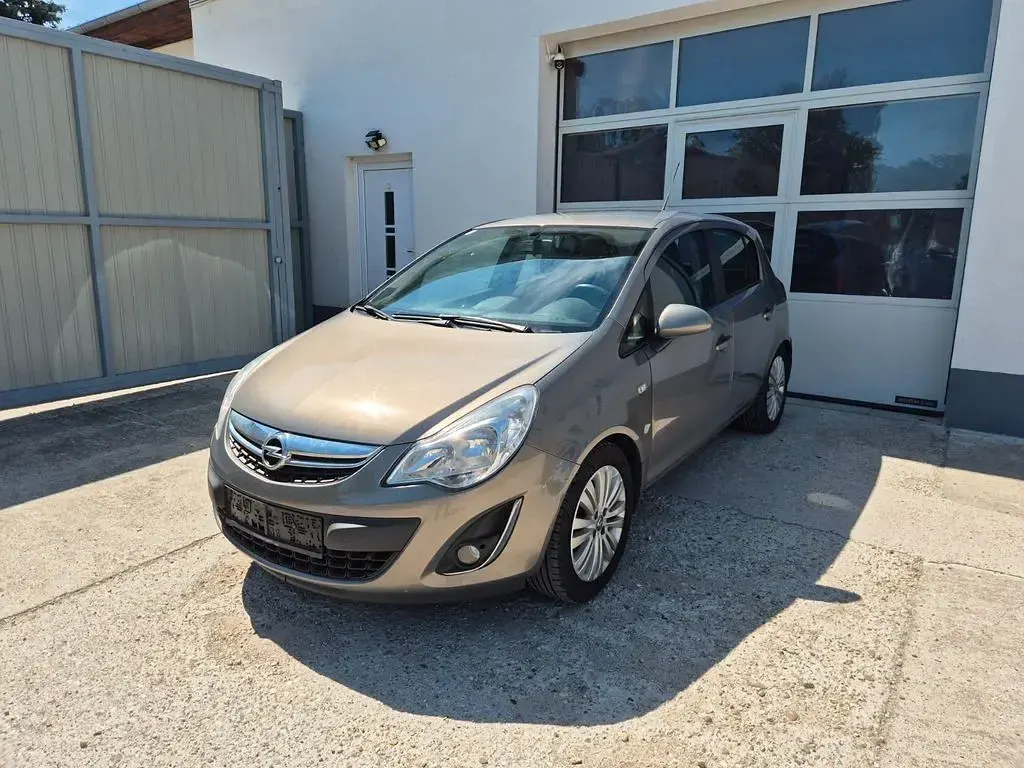 Gebraucht Opel Corsa Edition 75 PS (55 kW) 2011 Braun Kleinwagen