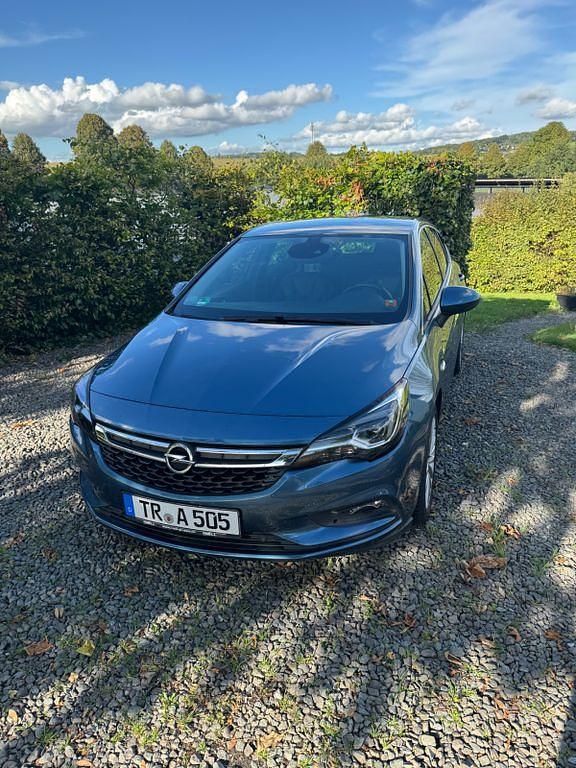 Blau Gebraucht 2015 Opel Astra Innovation Limousine | 8.399 € (Fairer Preis) - Bild 1/4