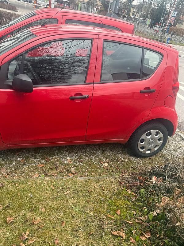 Gebraucht Opel Corsa 60 PS (44 kW) 2010 Rot Kleinwagen