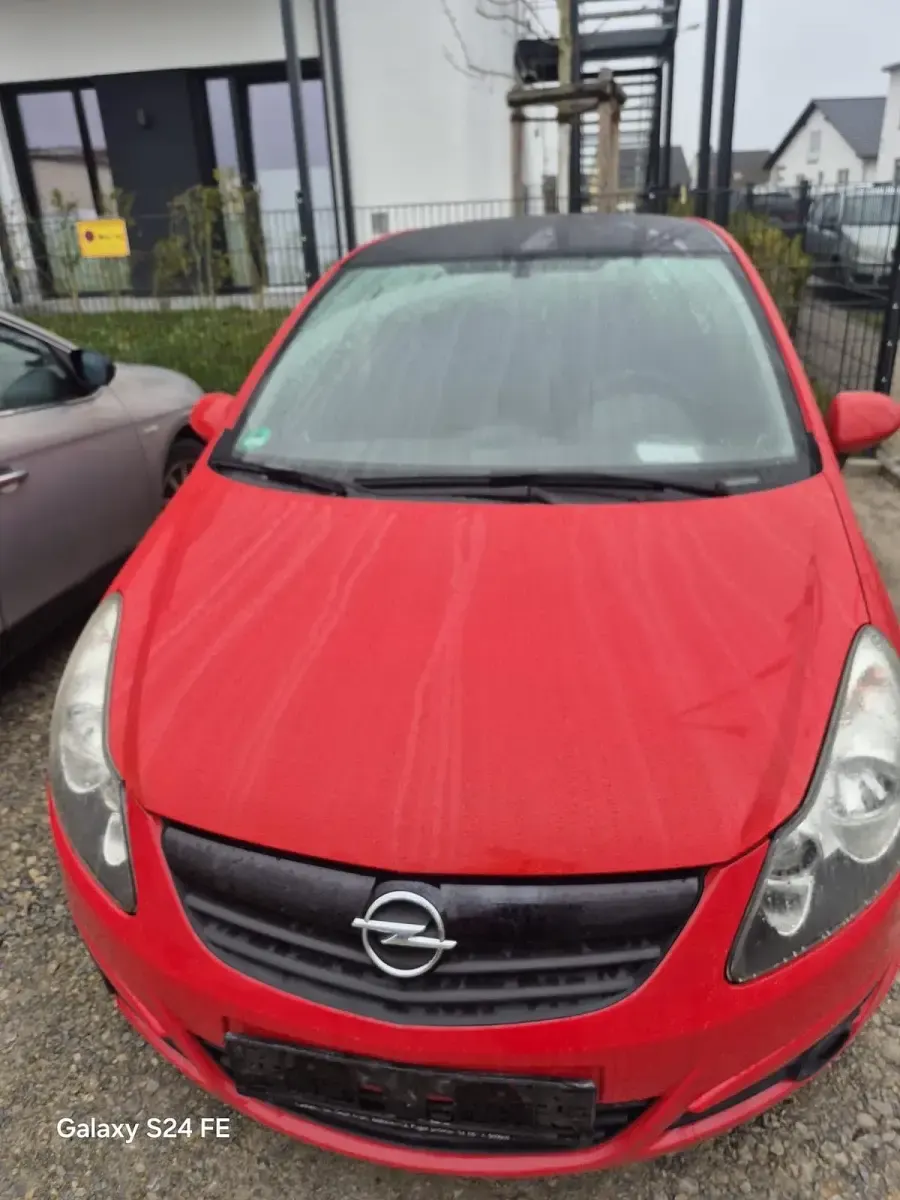 Używany Opel Corsa 59 KM (43 kW) 2010 Czerwony Hatchback