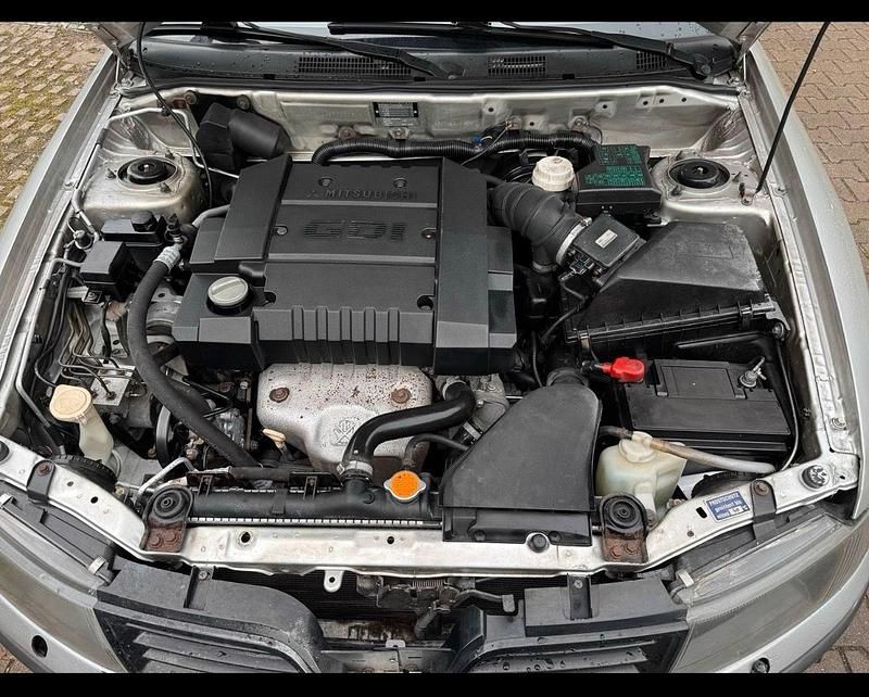 Gebraucht Mitsubishi Carisma 106 PS (77 kW) 2003 Grau Limousine