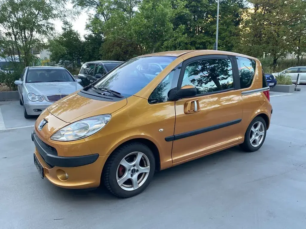 Gebraucht Peugeot 1007 109 PS (80 kW) 2006 Gold Van / Kleinbus