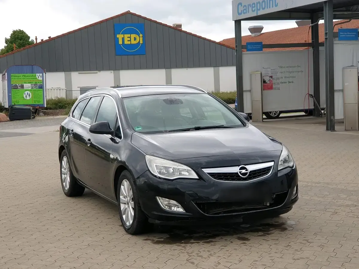 Gebraucht Opel Astra 120 PS (88 kW) 2012 Schwarz Kombi