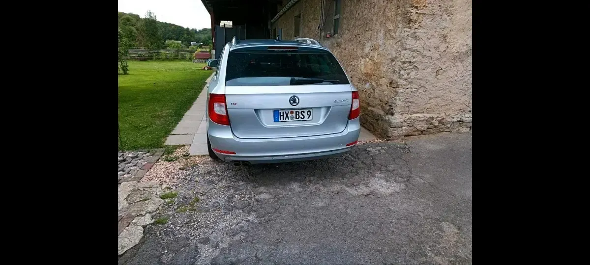 Używany Skoda Superb 170 KM (125 kW) 2012 Srebrny Kombi
