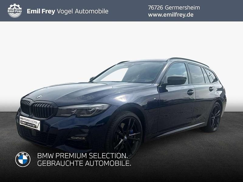 Tansanitblau ii metallic Gebraucht 2021 BMW 330e M Sport Kombi | 36.290 € (Etwas zu teuer) - Bild 1/3