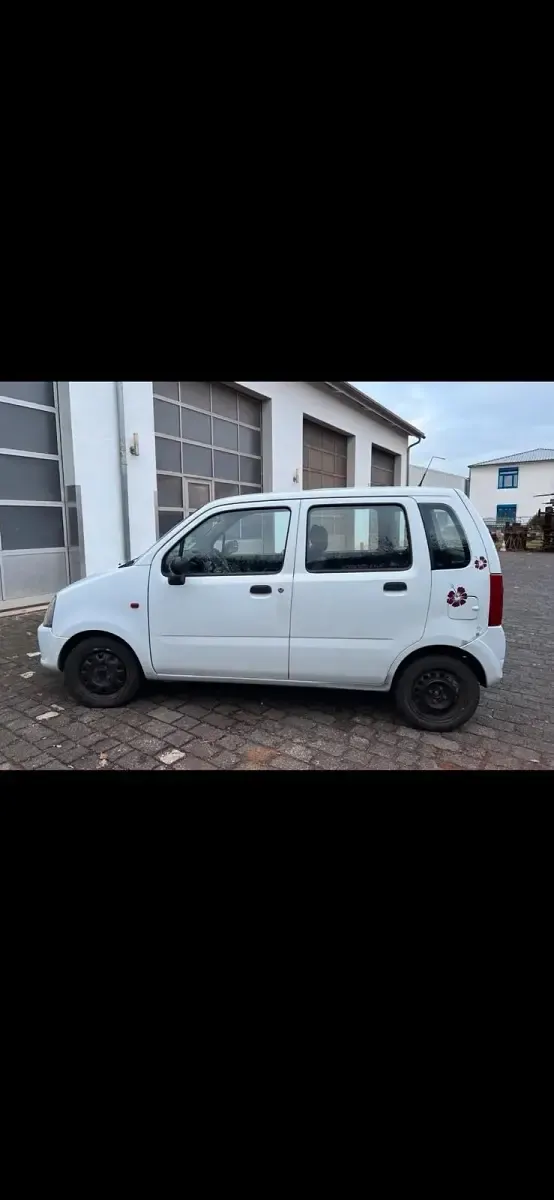 Używany Opel Agila 60 KM (44 kW) 2007 Biały Sedan/Limuzyna