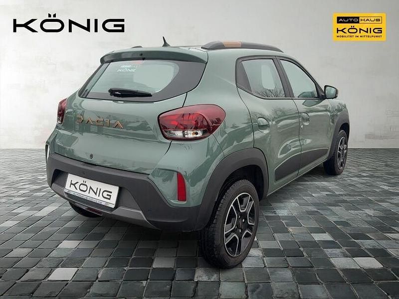Gebraucht Dacia Spring Extreme 47 kW (65 PS) 2023 Grün "flechtengrau" Kleinwagen