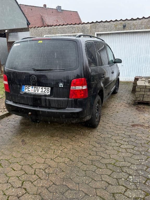 Gebraucht VW Touran Basis 102 PS (75 kW) 2004 Schwarz Van / Kleinbus