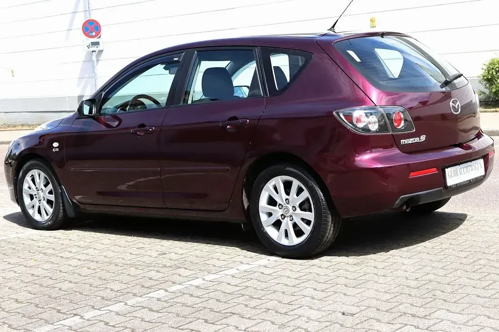 Używany Mazda 3 Active 105 KM (77 kW) 2007 Purpurowy Sedan/Limuzyna