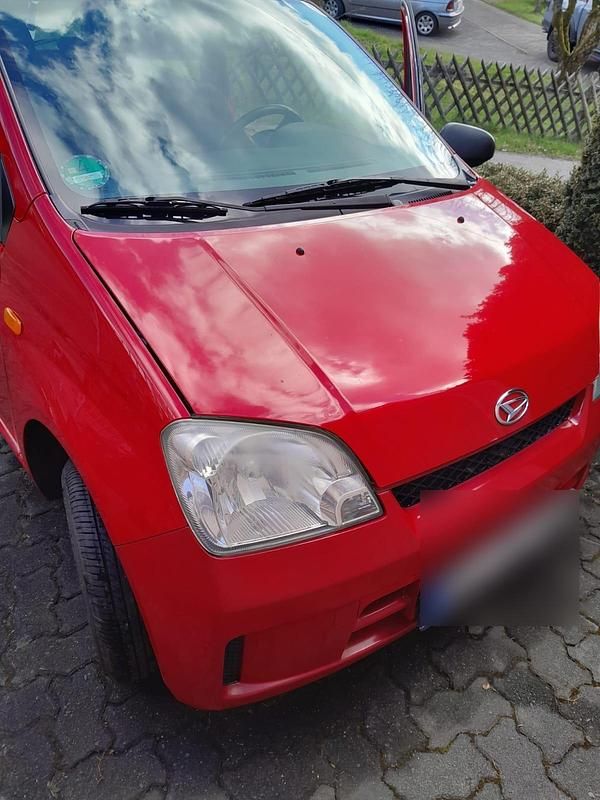 Gebraucht Daihatsu Cuore 58 PS (42 kW) 2006 Rot Kleinwagen