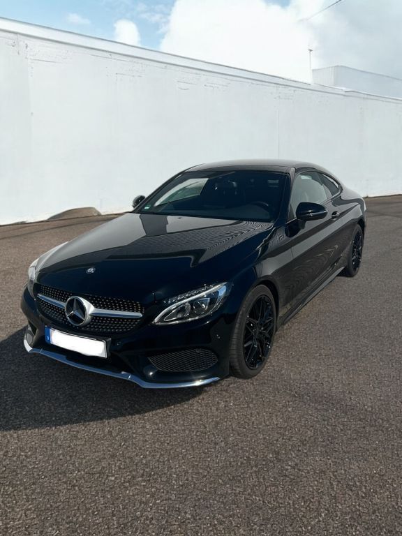 Schwarz Gebraucht 2016 Mercedes C180 AMG line Coupé | 22.400 € (Etwas zu teuer) - Bild 1/4