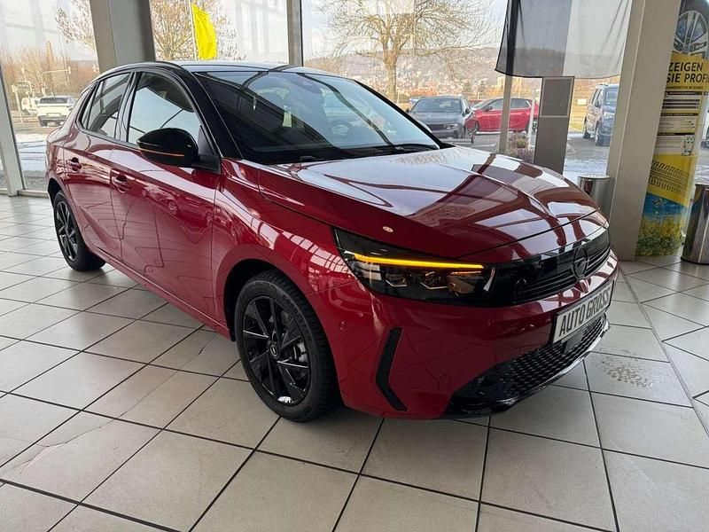 Gebraucht Opel Corsa 101 PS (74 kW) 2024 Lackierung peperoncino red/typ (metallic) Kleinwagen