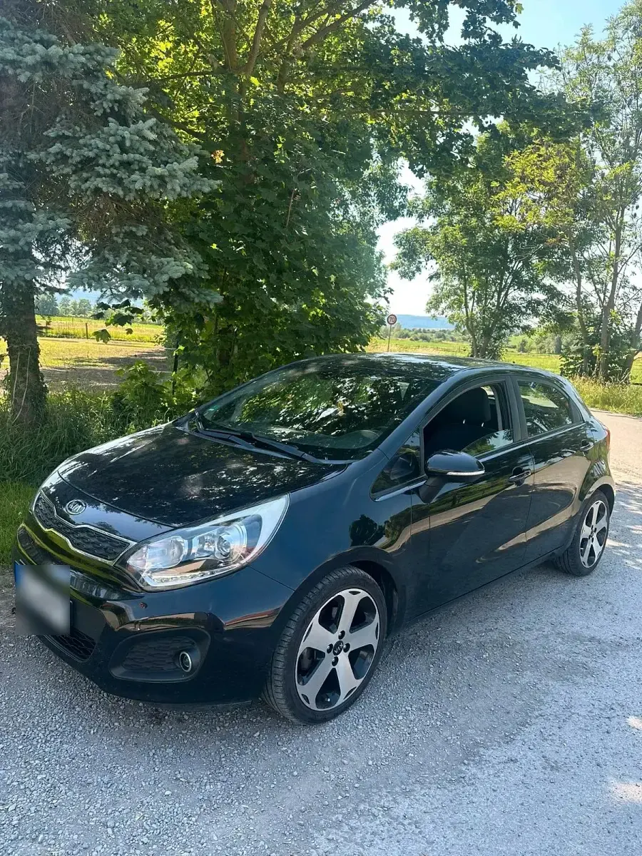 Gebraucht Kia Rio 108 PS (79 kW) 2011 Schwarz Kleinwagen