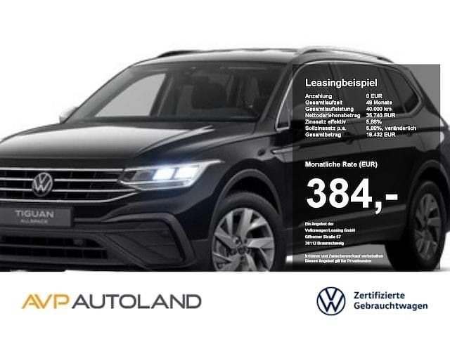 Deep black perleffekt (metallic) Gebraucht 2024 VW Tiguan Allspace Life SUV | 35.740 € (Superpreis) - Bild 1/4