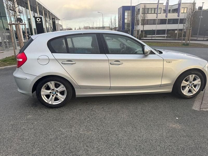 Second-hand BMW 116 122 CP (89 kW) 2010 Argintiu Hatchback