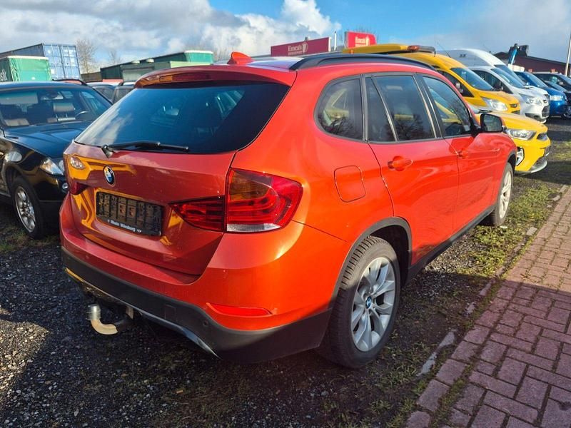 Second-hand BMW X1 Performance 218 CP (160 kW) 2015 Portocaliu SUV