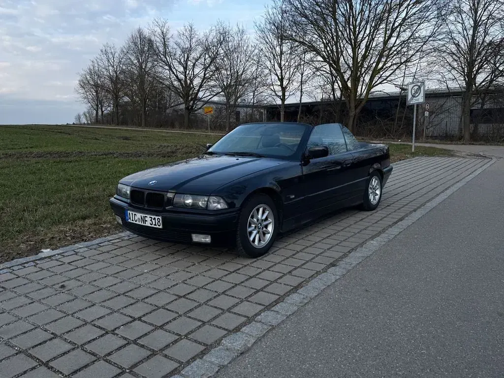 Gebraucht BMW 318 Basis 116 PS (85 kW) 1997 Schwarz Cabrio