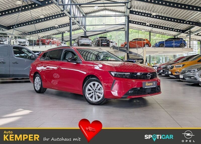 Red metallic Gebraucht 2024 Opel Astra Enjoy Kombi | 19.850 € (Fairer Preis) - Bild 1/4