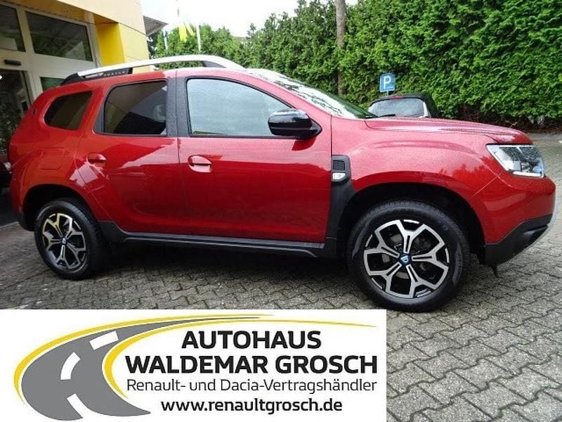 Fusionrot (metallic) Gebraucht 2020 Dacia Duster Celebration SUV | 12.964 € (Fairer Preis) - Bild 1/4
