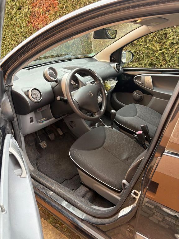 Gebraucht Peugeot 107 Filou 68 PS (50 kW) 2009 Schwarz Kleinwagen