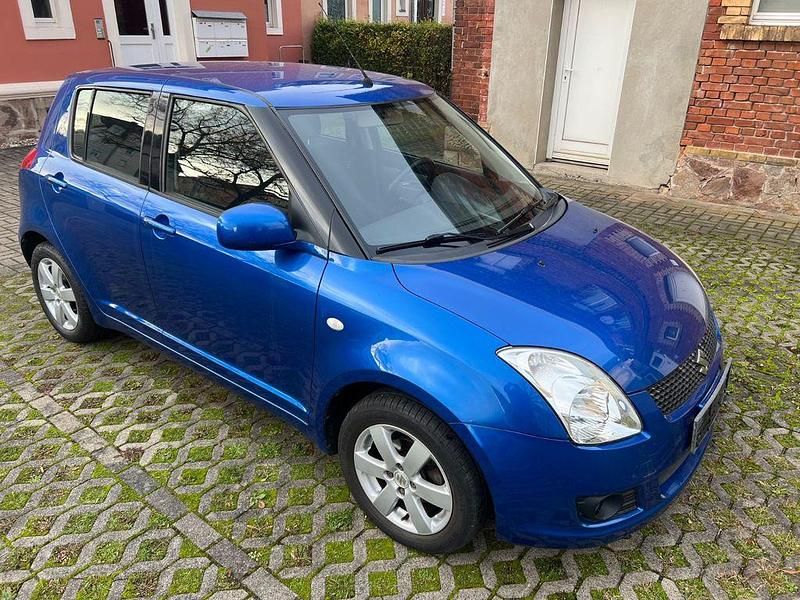 Blau Gebraucht 2009 Suzuki Swift Limousine | 5.555 € (Etwas zu teuer) - Bild 1/4