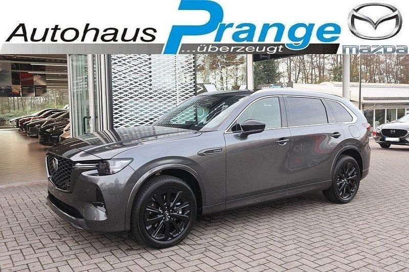 Machine gray Neu 2025 Mazda CX-80 Homura-Line SUV | 57.406 € (Fairer Preis) - Bild 1/4