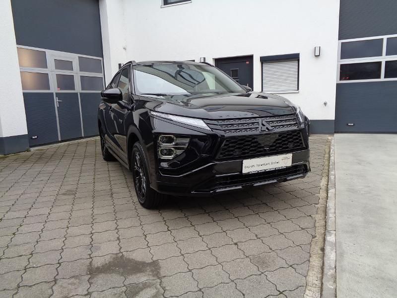 Pantherschwarz Gebraucht 2023 Mitsubishi Eclipse Cross Top SUV | 26.990 € (Fairer Preis) - Bild 1/4