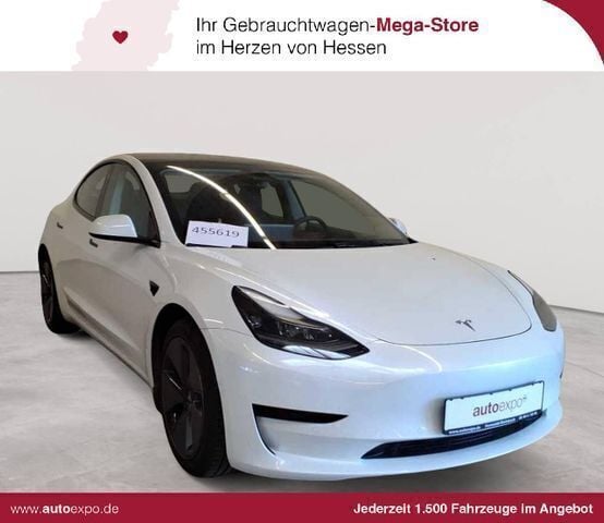 Pearl white multicoat Gebraucht 2021 Tesla Model 3 Standard Range Plus Limousine | 23.390 € (Superpreis) - Bild 1/2