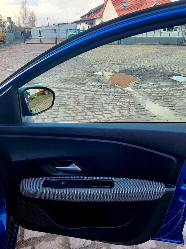 Gebraucht Dacia Sandero Expression 101 PS (74 kW) 2023 Blau Limousine