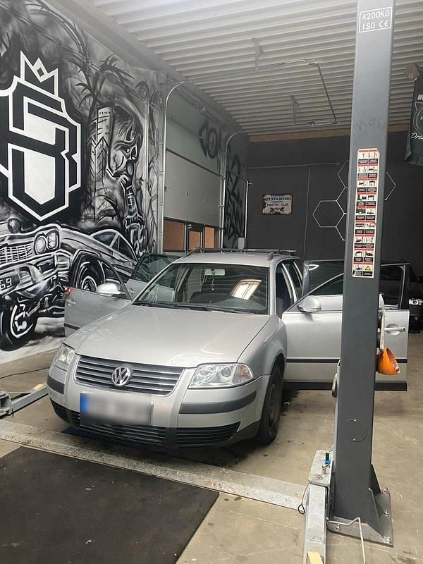 Second-hand VW Passat 131 CP (96 kW) 2004 Argintiu Break