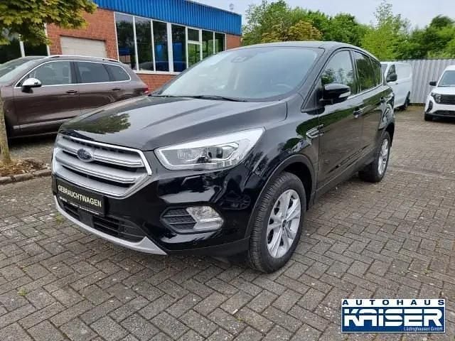 Iridiumschwarz mica Gebraucht 2018 Ford Kuga Titanium SUV | 15.799 € (Fairer Preis) - Bild 1/4