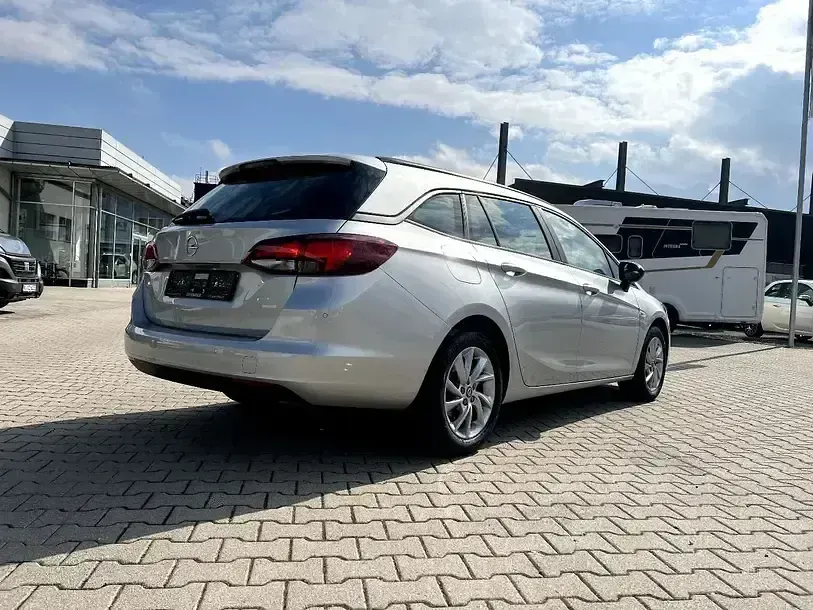 Używany Opel Astra 110 KM (80 kW) 2021 Srebrny Kombi