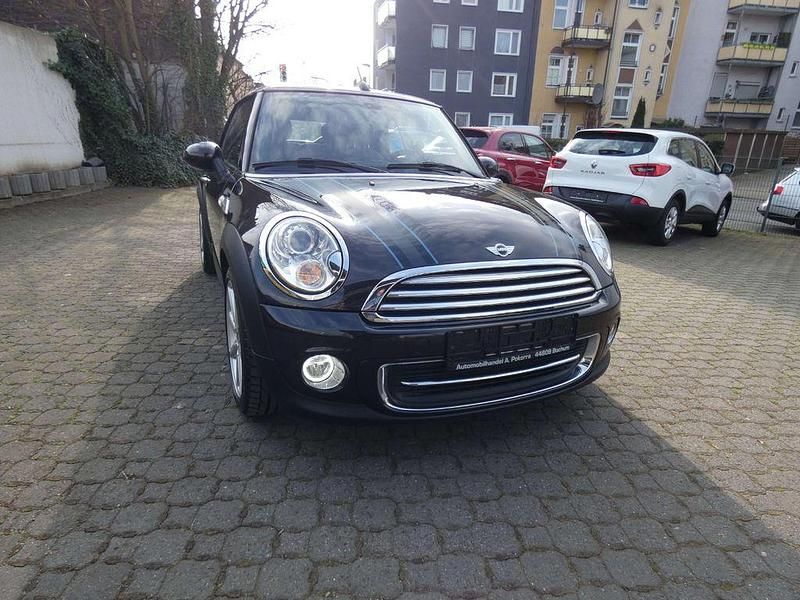 Gebraucht Mini Cooper Cabriolet 122 PS (89 kW) 2015 Iced chocolate metallic Cabrio