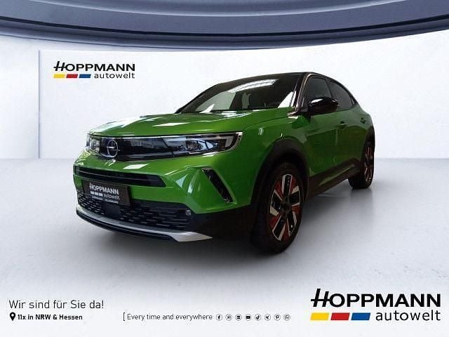 Grün Gebraucht 2021 Opel Mokka-e Ultimate SUV | 19.990 € (Fairer Preis) - Bild 1/4