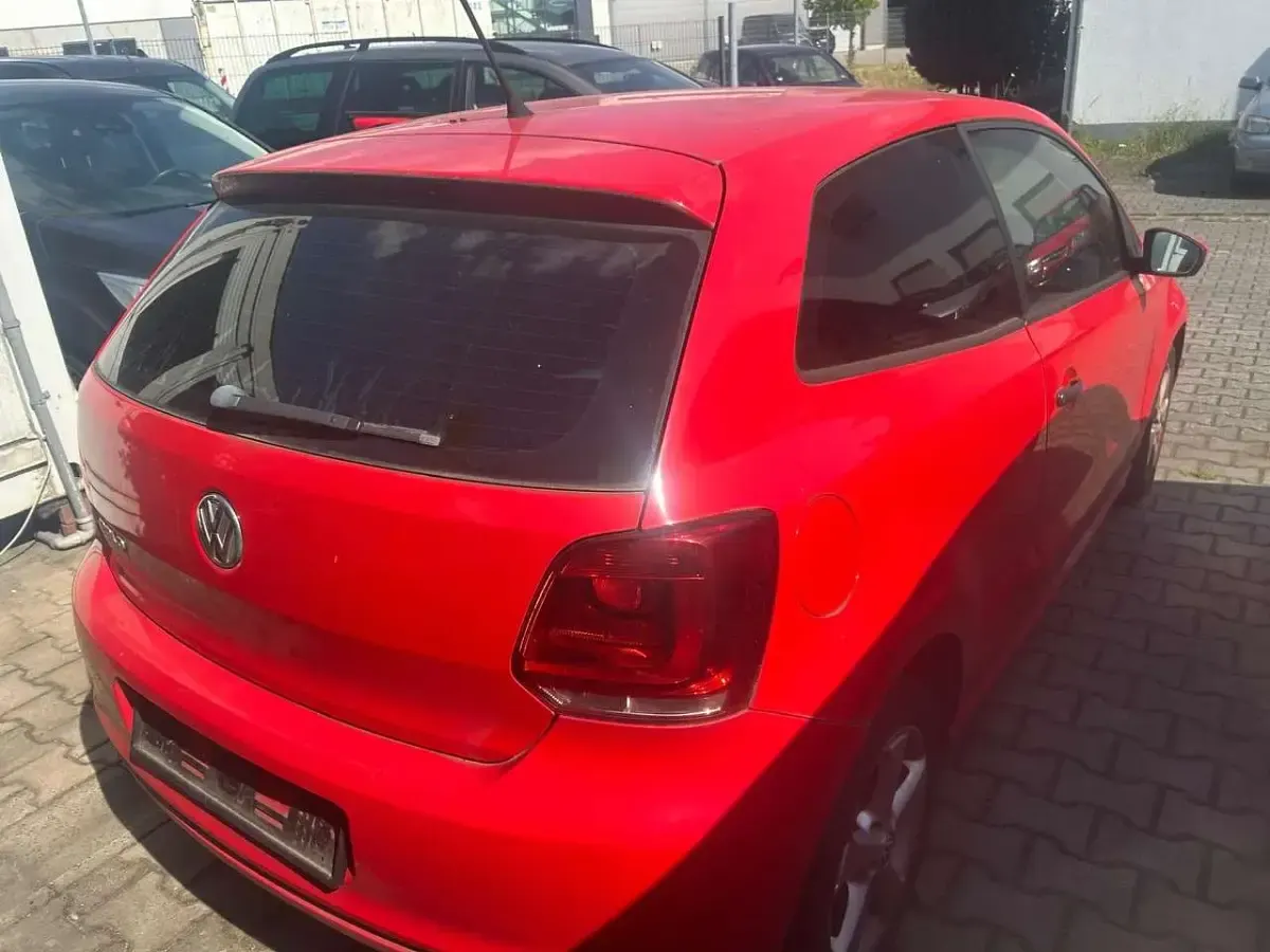 Gebraucht VW Polo Trendline 60 PS (44 kW) 2012 Flashrot Kleinwagen