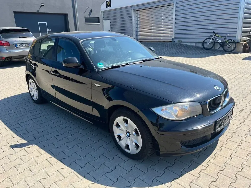 Gebraucht BMW 116 116 PS (85 kW) 2010 Schwarz Kleinwagen