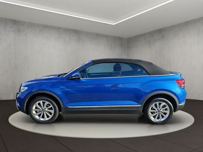 Gebraucht VW T-Roc Cabriolet Style 150 PS (110 kW) 2024 Ravennablau metallic/schwarz Cabrio