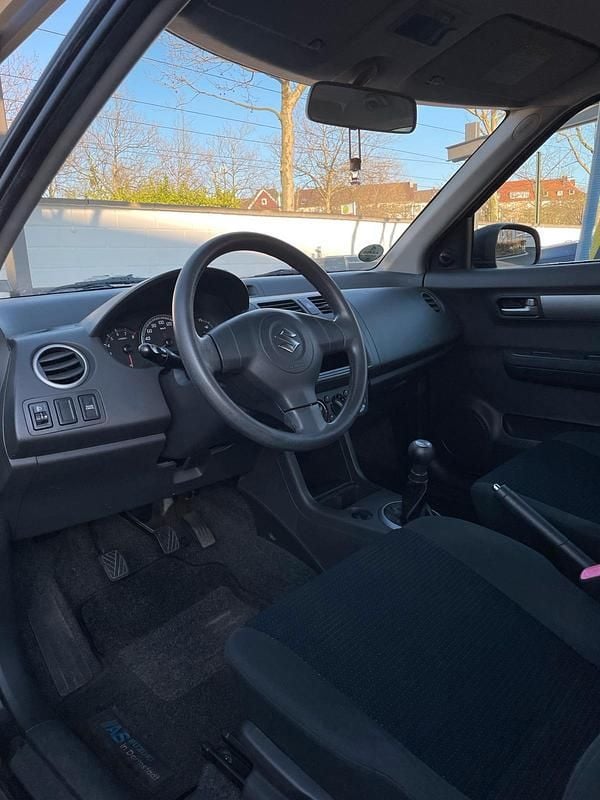 Gebraucht Suzuki Swift 92 PS (67 kW) 2009 Schwarz Kleinwagen