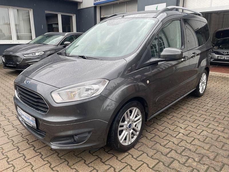 Grau Gebraucht 2018 Ford Tourneo Courier Titanium Van / Kleinbus | 10.899 € (Guter Preis) - Bild 1/4