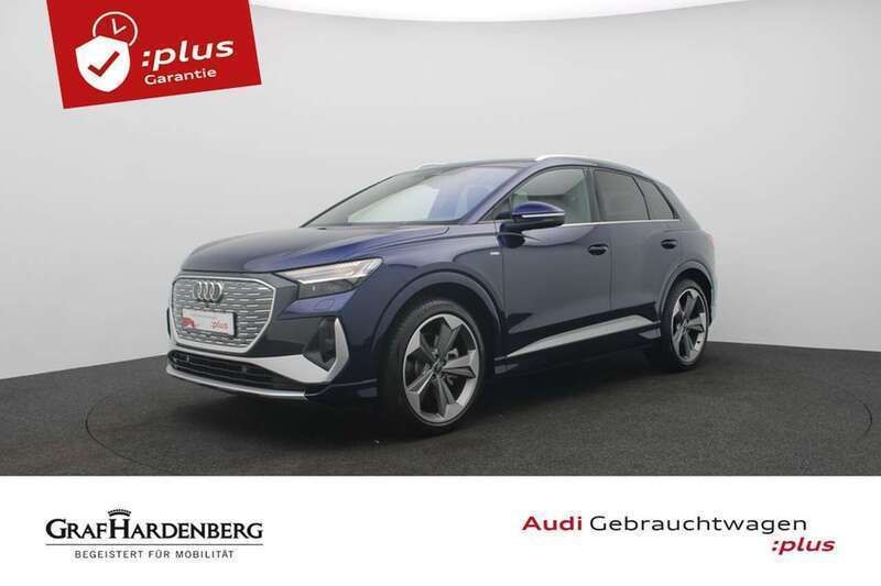Navarrablau metallic Gebraucht 2024 Audi Q4 e-tron Ambiente SUV | 62.980 € - Bild 1/4