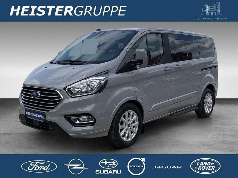Grau (fancygrau) Gebraucht 2023 Ford Tourneo Custom Titanium Van | 39.890 € (Superpreis) - Bild 1/4