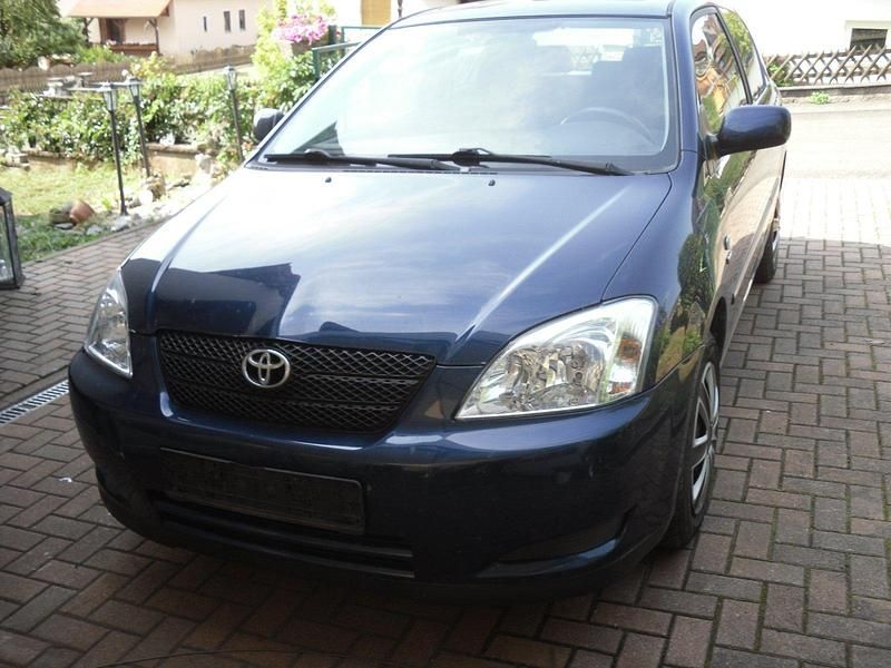 Blau Gebraucht 2003 Toyota Corolla Limousine | 1.800 € (Fairer Preis) - Bild 1/4