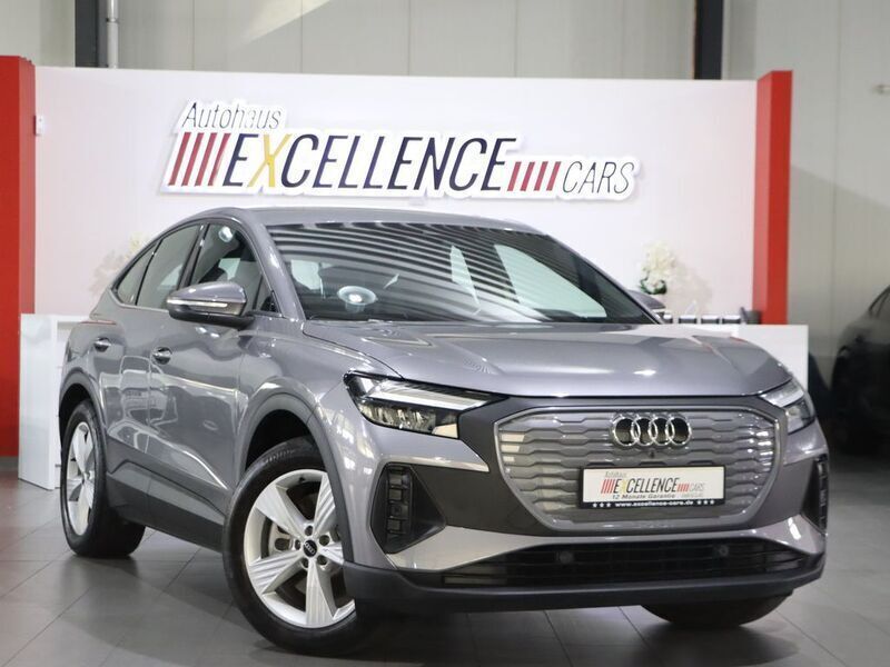Taifungrau metallic Gebraucht 2022 Audi Q4 Sportback e-tron S-Line SUV | 34.111 € (Guter Preis) - Bild 1/4