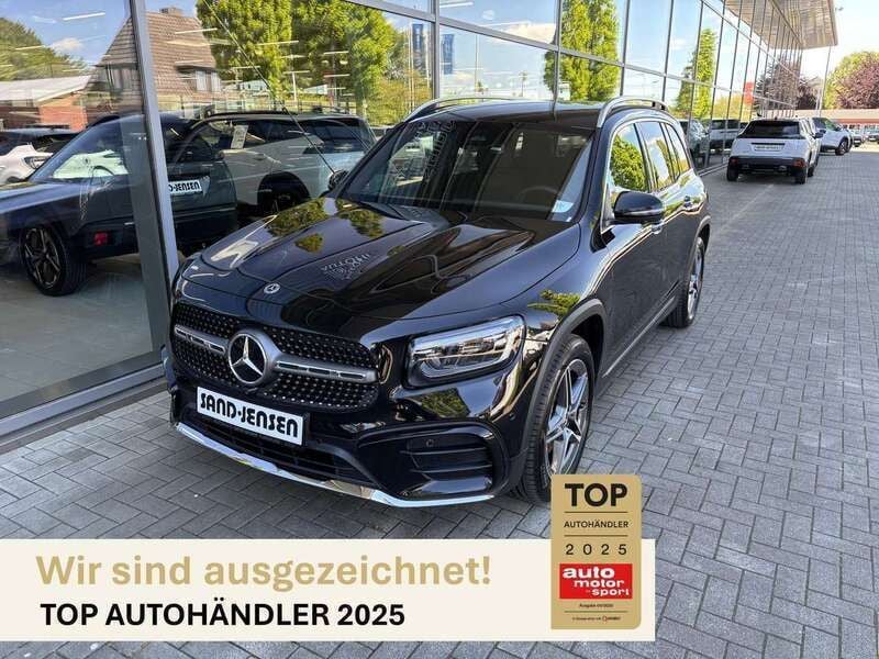 Kosmosschwarz metallic Gebraucht 2024 Mercedes GLB220 AMG line SUV | 48.995 € (Fairer Preis) - Bild 1/4