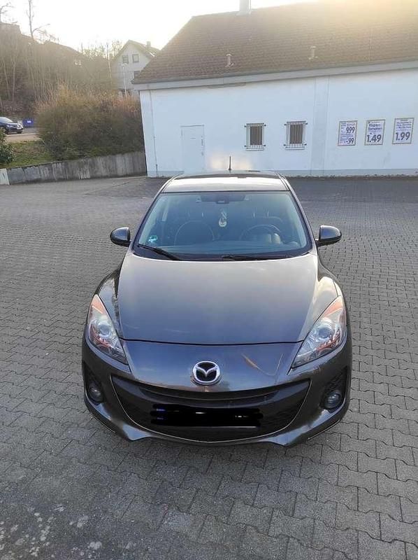 Grau Gebraucht 2012 Mazda 3 Limousine | 3.900 € (Fairer Preis) - Bild 1/4